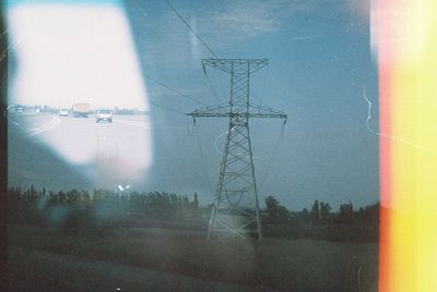 Electricity pylon against sky