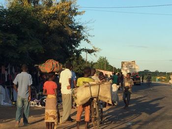 People on road against sky