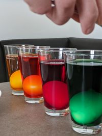 Close-up of beer glasses on table