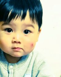 Close-up portrait of cute boy