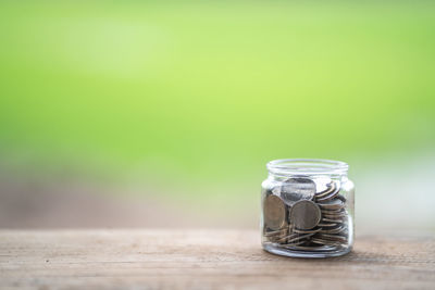 Close-up of glass jar on table