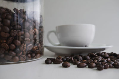 Close-up of coffee beans on table