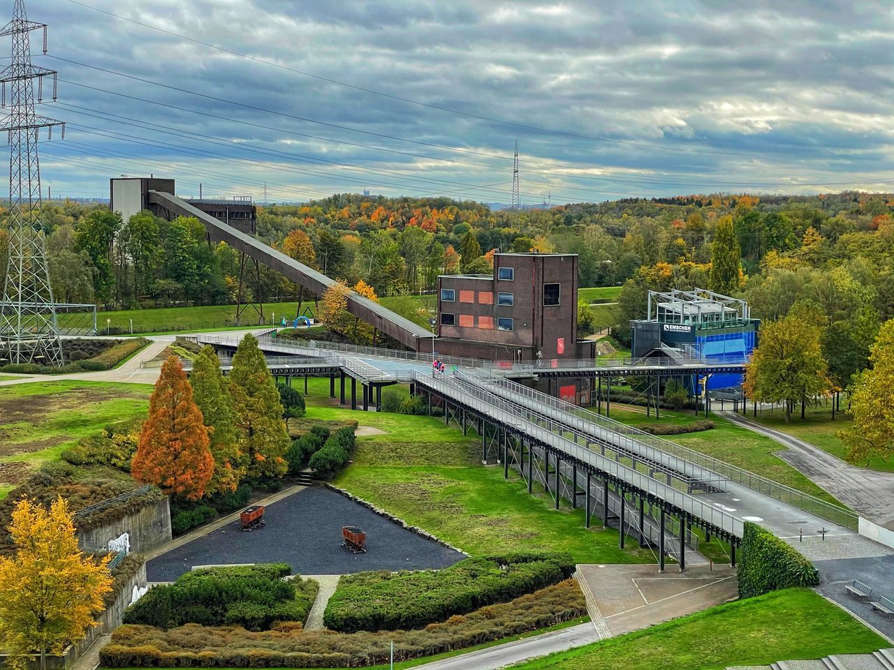 ROAD BY BUILDINGS AGAINST SKY