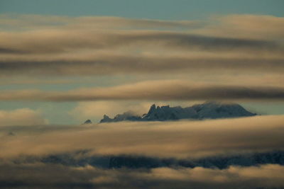 Scenic view of clouds in sky at sunset