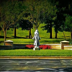 Statue amidst trees in park