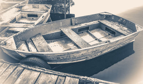 High angle view of abandoned boat against sky