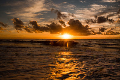 Scenic view of sea against sky during sunset