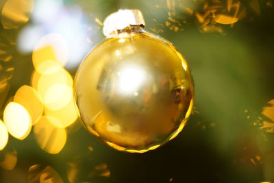 Close-up of illuminated light bulb