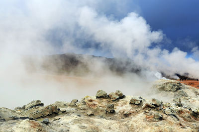 Panoramic view of landscape against cloudy sky