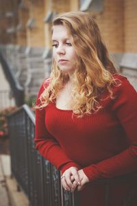 Portrait of young woman looking away