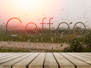 Close-up of wet glass window in rainy season