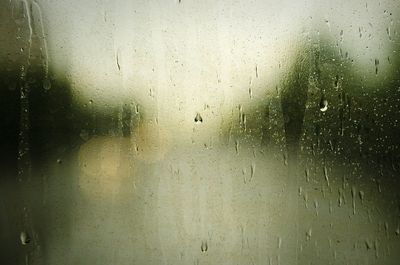 Full frame shot of wet window in rainy season