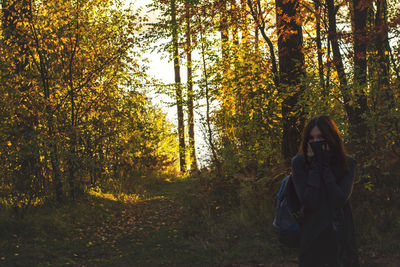 Side view of hiker in forest