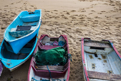 High angle view of boats moored on beach