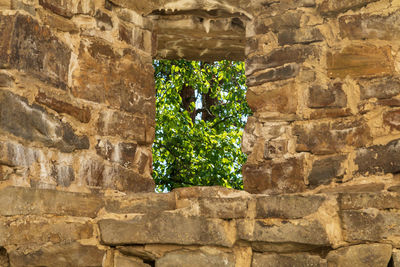 Low angle view of stone wall in old building