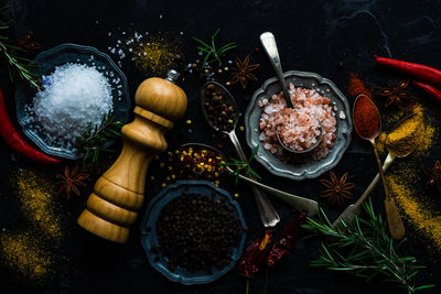 High angle view of spices and seasonings on table
