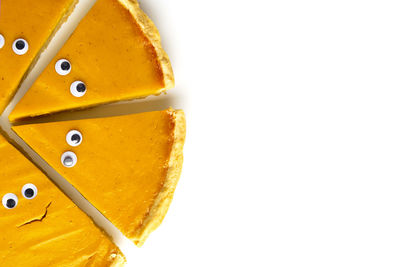 Close-up of fruit against white background
