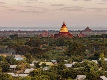 High angle view of trees and the historic temples of bagan in myanmar against sky