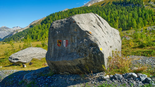 Scenic view of rock against sky