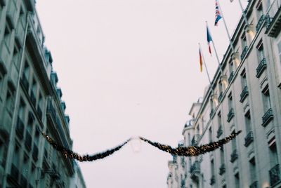 Low angle view of buildings against clear sky