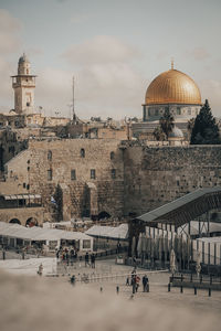 Group of people in front of historical building