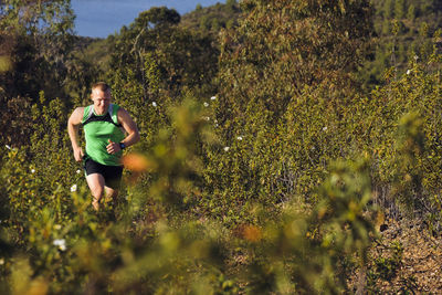 Man running, algarve, portugal  on the move