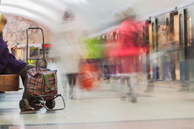 Blurred image of people on subway station