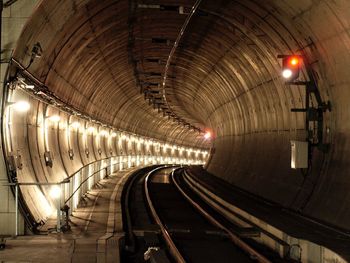 Interior of illuminated railway tunnel