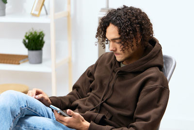 Young woman using mobile phone