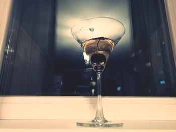 Close-up of wine glass on table