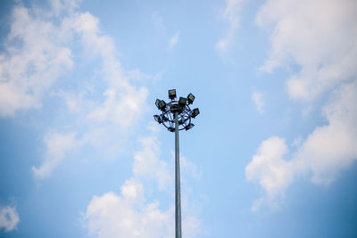 Low angle view of street light against sky