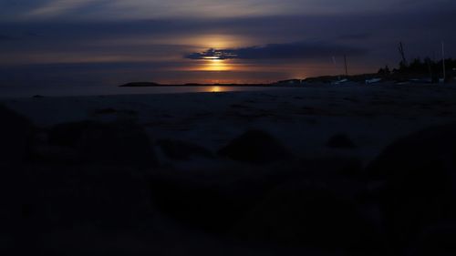 Scenic view of beach against sky during sunset