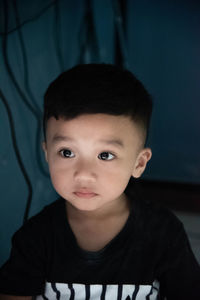 Portrait of cute boy at home