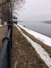 Scenic view of sea against sky during winter