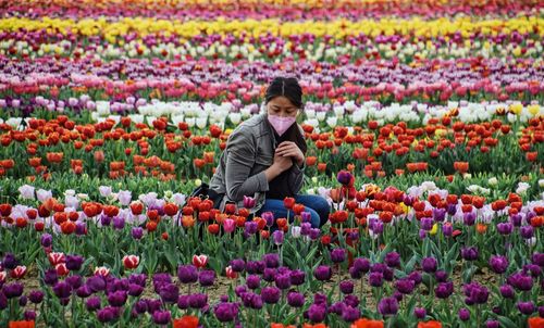 Full length of a person on field