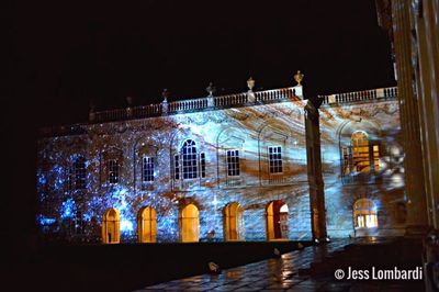 Illuminated stage in city at night