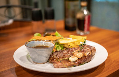 Close-up of food served on table