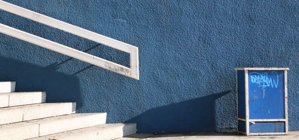 Sunlight falling on steps and wall