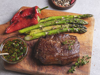 High angle view of vegetables on cutting board