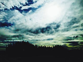 Scenic view of landscape against cloudy sky