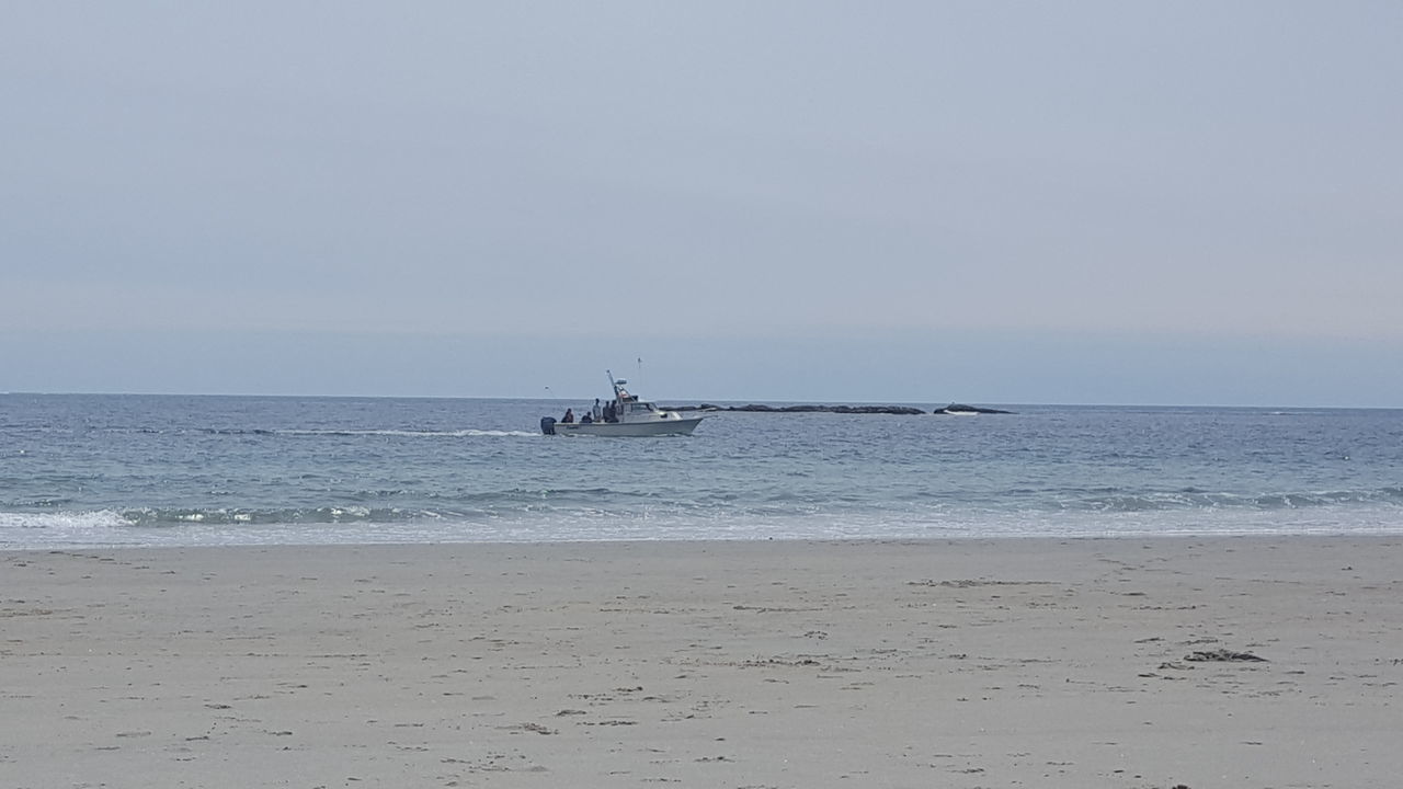 SHIP SAILING ON SEA AGAINST CLEAR SKY