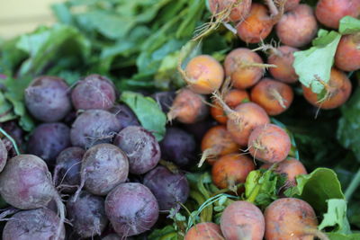 Close-up of beets and carrots for sale at market