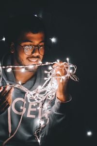 Portrait of man wearing eyeglasses