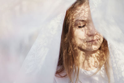Portrait of woman with eyes closed
