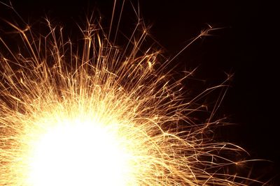 Firework display at night