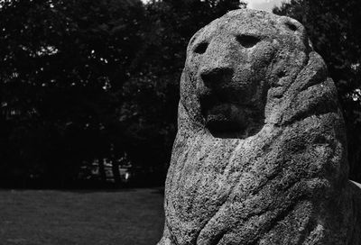 Close-up of stone sculpture in cemetery