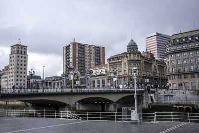 Buildings in city against sky