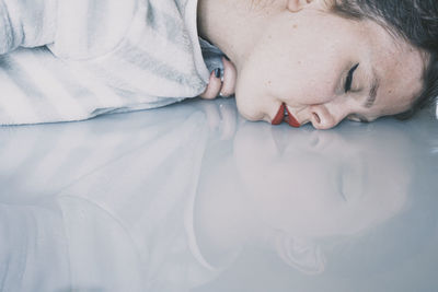 Close-up of woman lying down