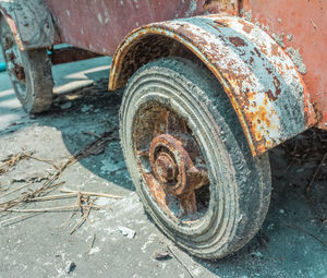 Close-up of abandoned car on the road