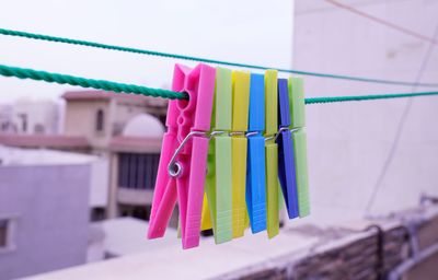 Close-up of clothes hanging on clothesline